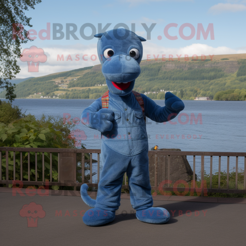 Loch Ness Monster mascot costume character dressed with a Denim Shirt ...