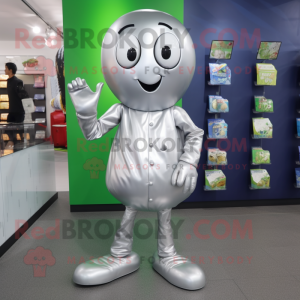 Silver Zucchini mascot costume character dressed with a Shorts and Coin purses