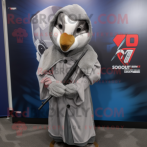 Gray Sniper mascot costume character dressed with a Windbreaker and Shawl pins