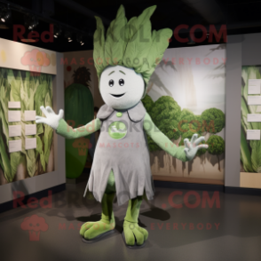 Silver Celery mascot costume character dressed with a Graphic Tee and Brooches