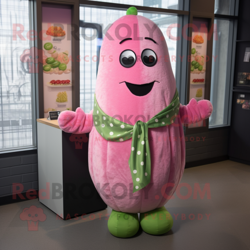 Pink Cucumber mascot costume character dressed with a Cardigan and Tie pins