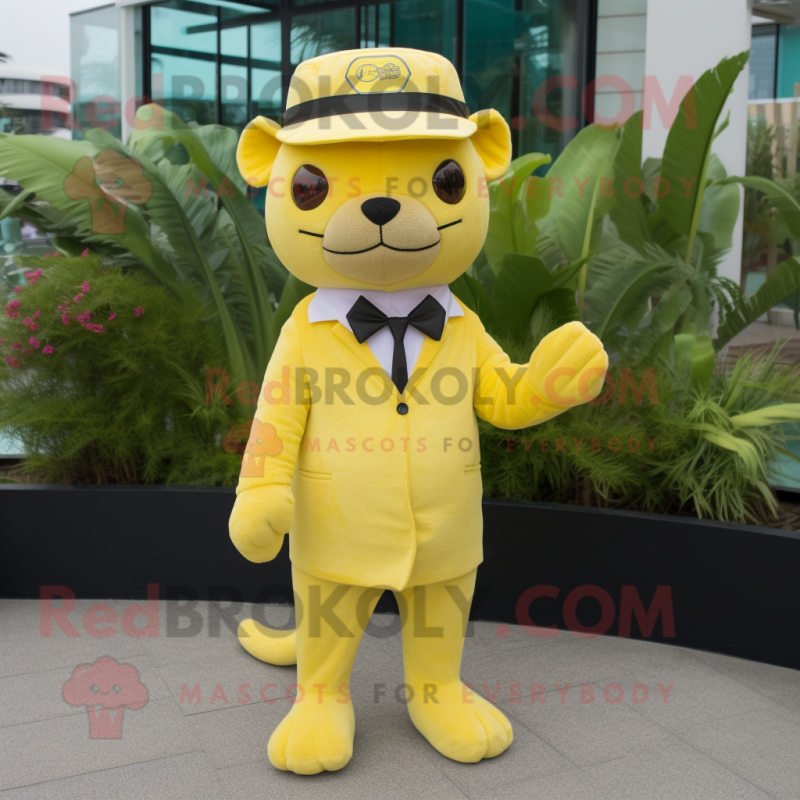 Lemon Yellow Jaguarundi mascot costume character dressed with a Suit Pants and Berets