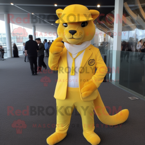 Lemon Yellow Jaguarundi mascot costume character dressed with a Suit Pants and Berets