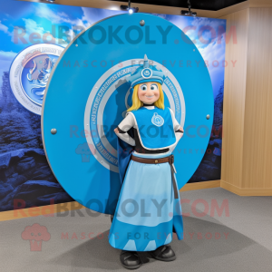 Blue Celtic Shield mascot costume character dressed with a Maxi Skirt and Shoe laces