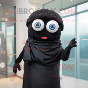 Black Cyclops mascot costume character dressed with a Blouse and Scarf clips