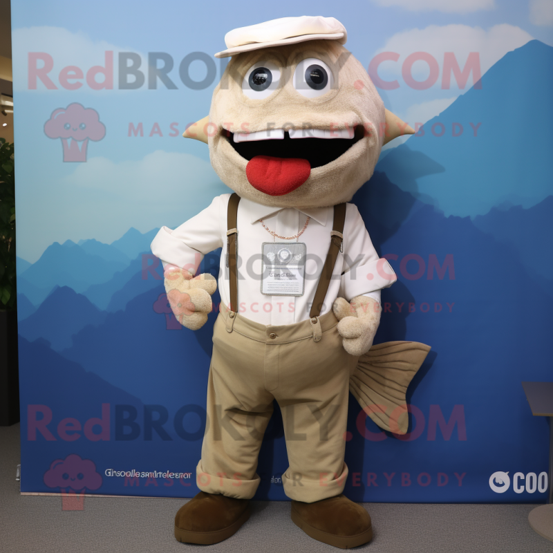 Cream Cod mascot costume character dressed with a Dungarees and Tie pins