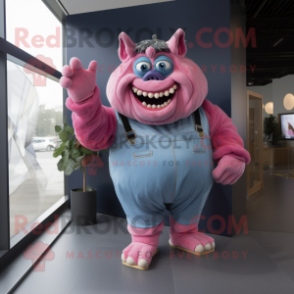 Pink Ogre mascot costume character dressed with a Chambray Shirt and Gloves