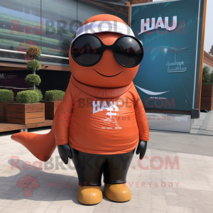 Rust Humpback Whale mascot costume character dressed with a Polo Tee and Eyeglasses