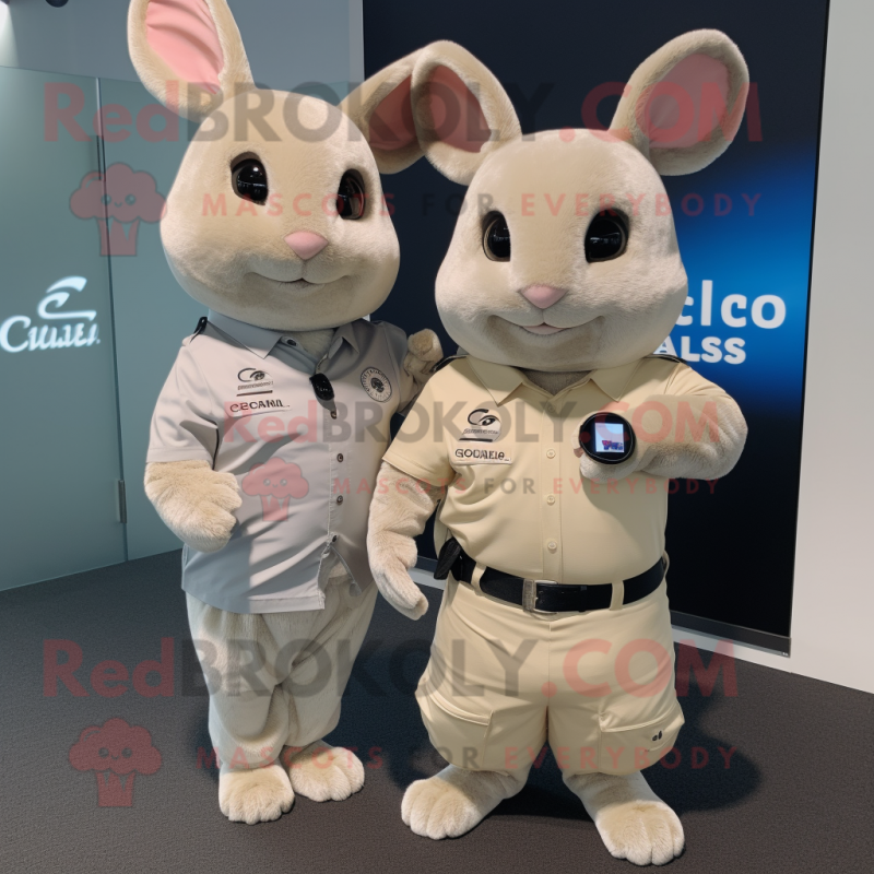Tan Chinchilla mascot costume character dressed with a Polo Shirt and Smartwatches