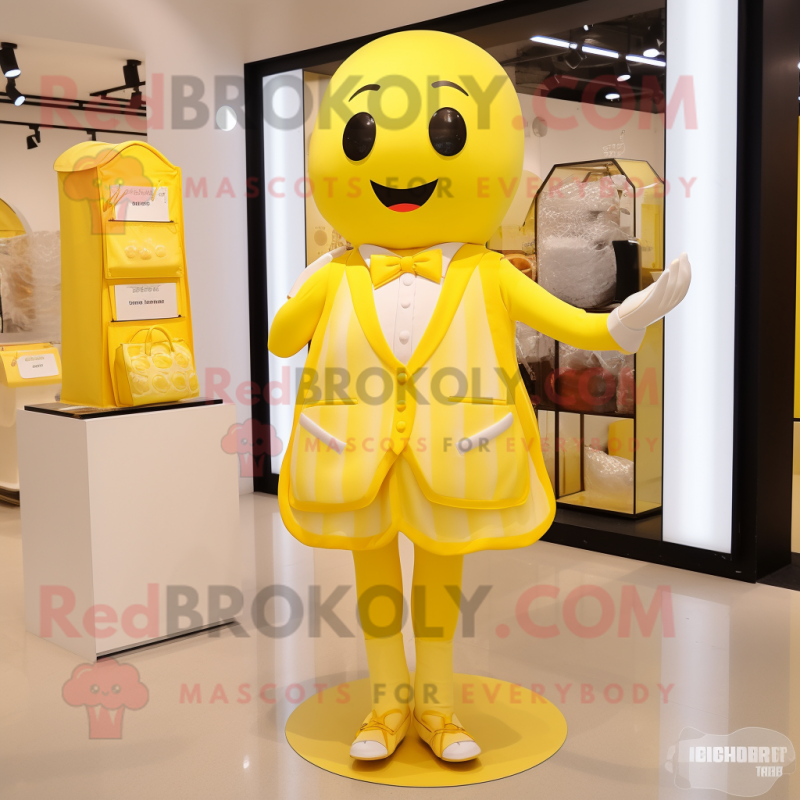 Lemon Yellow Chocolates mascot costume character dressed with a Sheath Dress and Coin purses