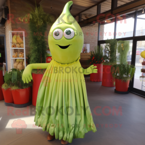 Lime Green Shakshuka mascot costume character dressed with a Empire Waist Dress and Tie pins