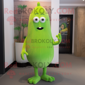 Lime Green Shakshuka mascot costume character dressed with a Empire Waist Dress and Tie pins