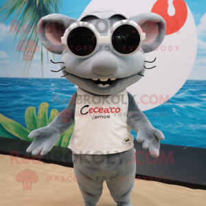 Gray Ceviche mascot costume character dressed with a Henley Shirt and Sunglasses