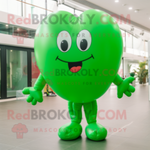 Green Heart Shaped Balloons mascot costume character dressed with a Jumpsuit and Shoe laces