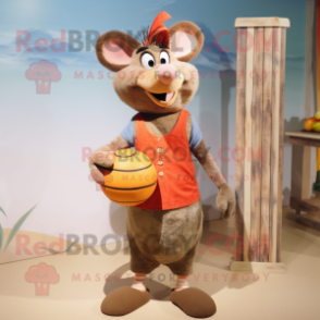 Peach Ratatouille mascot costume character dressed with a Board Shorts and Earrings