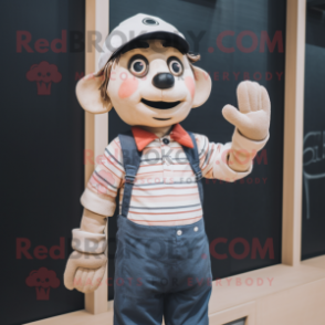 Tan Mime mascot costume character dressed with a Denim Shorts and Mittens