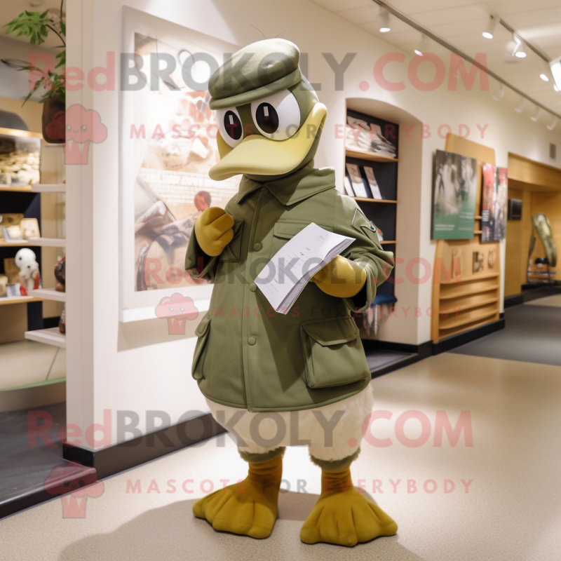 Olive Swan mascot costume character dressed with a Trousers and Caps