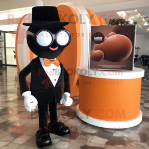 Peach Chocolates mascot costume character dressed with a Tuxedo and Sunglasses