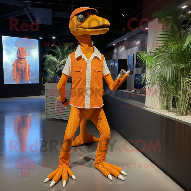 Orange Velociraptor mascot costume character dressed with a Chinos and Shoe laces