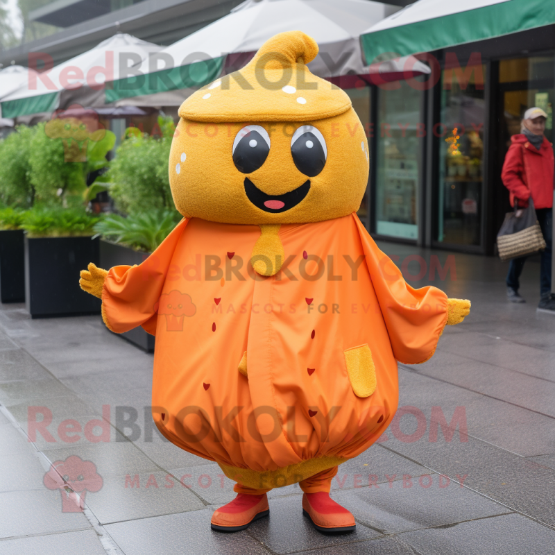 Orange Falafel mascot costume character dressed with a Raincoat and Earrings