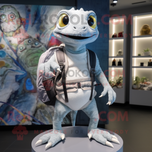 Silver Geckos mascot costume character dressed with a Sweater and Backpacks