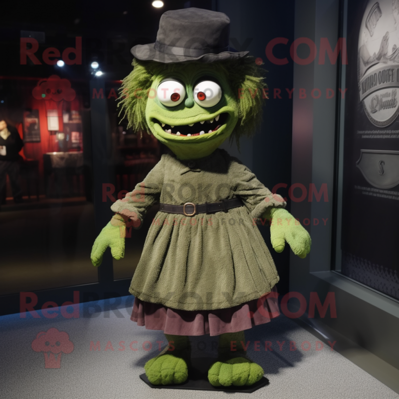 Olive Frankenstein'S Monster mascot costume character dressed with a Pleated Skirt and Hats
