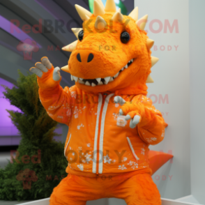 Orange Stegosaurus mascot costume character dressed with a Hoodie and Lapel pins