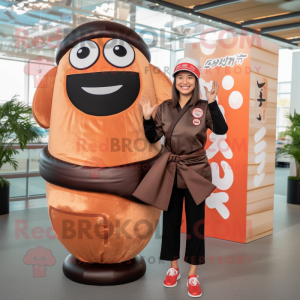 Brown Sushi mascot costume character dressed with a Yoga Pants and Caps