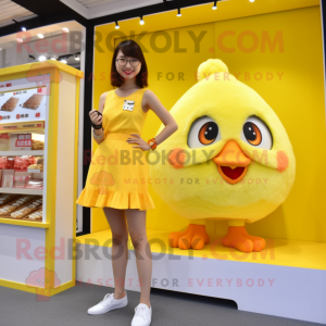Lemon Yellow Fried Chicken mascot costume character dressed with a Mini Skirt and Keychains