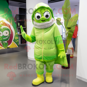 Lime Green Pizza Slice mascot costume character dressed with a Parka and Scarves