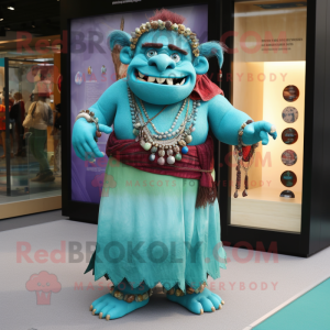 Turquoise Ogre mascot costume character dressed with a Maxi Skirt and Keychains