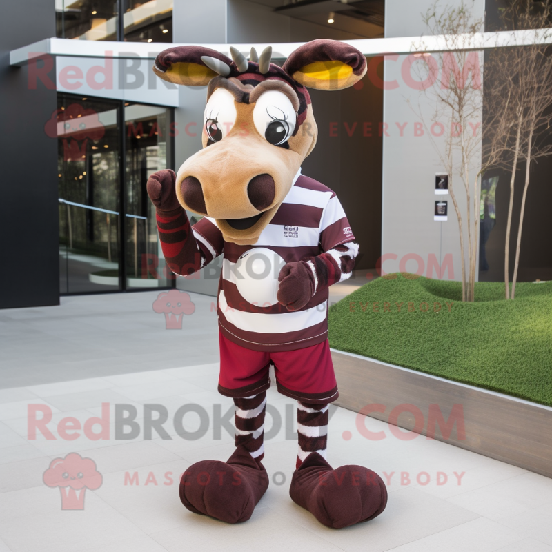 Maroon Okapi mascot costume character dressed with a Rugby Shirt and  Mittens - Mascot Costumes -  Sizes L (175-180CM)