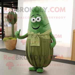 Olive Cucumber mascot costume character dressed with a Pleated Skirt and Belts