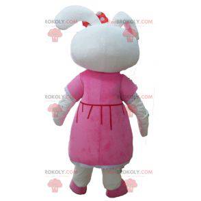Mascotte simpatico coniglio bianco vestito con un abito rosa -