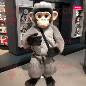 Gray Capuchin Monkey mascot costume character dressed with a Henley Shirt and Mittens