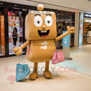 Tan Candy Box mascot costume character dressed with a Skinny Jeans and Tote bags