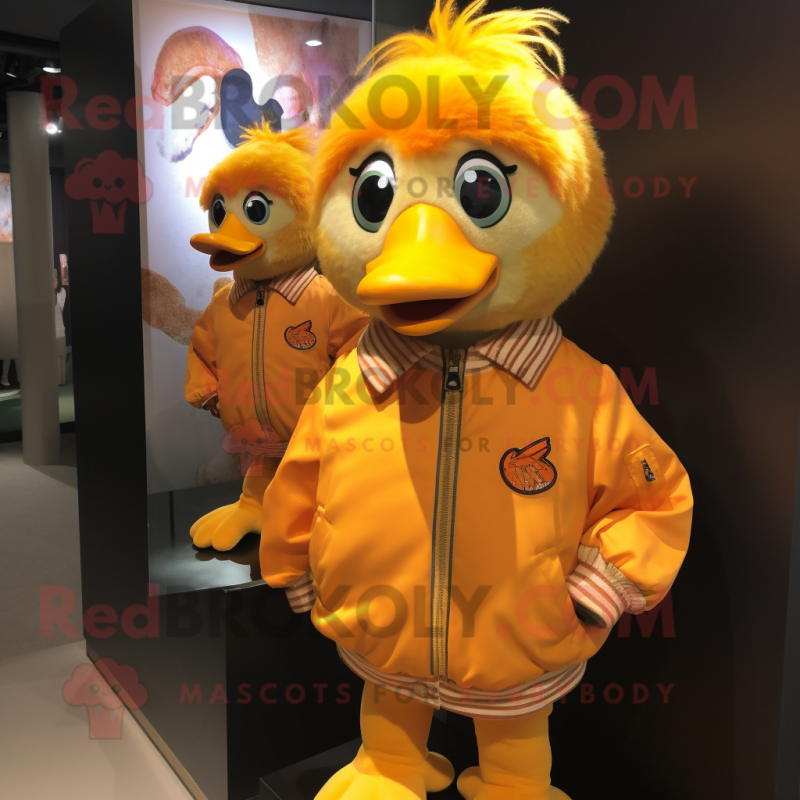 Orange Canary mascot costume character dressed with a Bomber Jacket and Hairpins