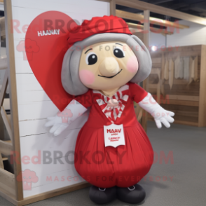 nan Heart mascot costume character dressed with a Jumpsuit and Headbands