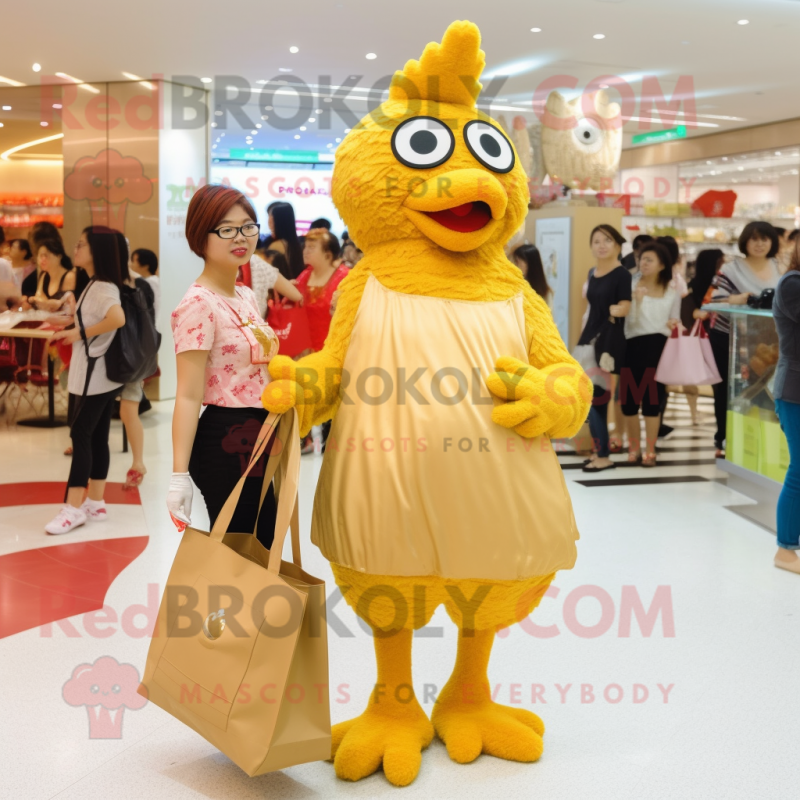 Gold Fried Chicken mascot costume character dressed with a A-Line Dress and Tote bags