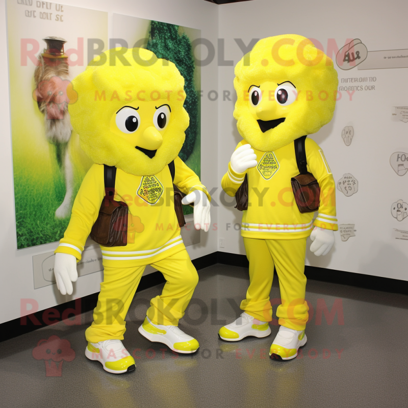 Lemon Yellow Irish Dancing Shoes mascot costume character dressed with a Hoodie and Messenger bags