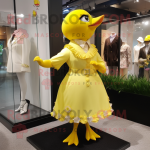 Yellow Dove mascot costume character dressed with a Mini Dress and Cufflinks