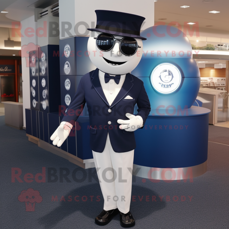 Navy Golf Ball mascot costume character dressed with a Suit Jacket and Cufflinks
