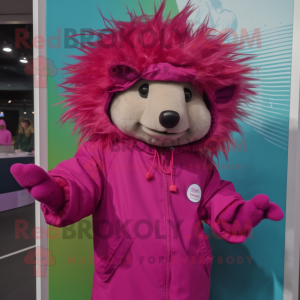 Magenta Porcupine mascot costume character dressed with a Raincoat and Caps