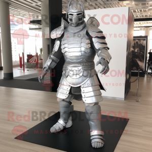 Silver Samurai mascot costume character dressed with a Suit and Foot pads