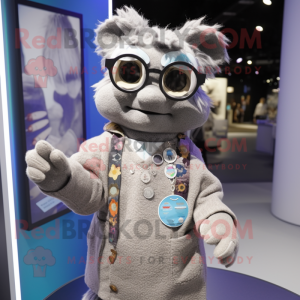 Silver Bracelet mascot costume character dressed with a Cardigan and Eyeglasses