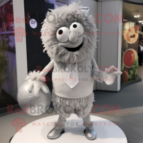 Silver Meatballs mascot costume character dressed with a Cardigan and Clutch bags