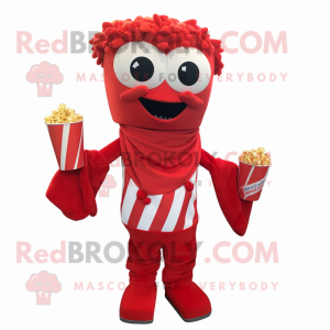 Red Pop Corn mascot costume character dressed with a Shorts and Scarves