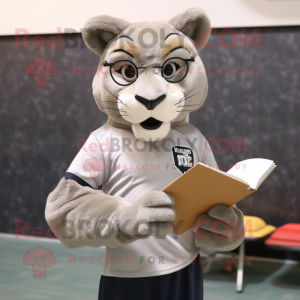Gray Mountain Lion mascot costume character dressed with a Polo Shirt and Reading glasses