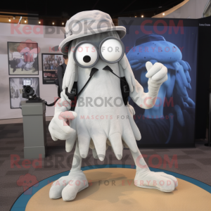 Gray Fried Calamari mascot costume character dressed with a Romper and Backpacks