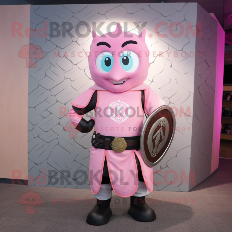 Pink Celtic Shield mascot costume character dressed with a Rash Guard and Ties
